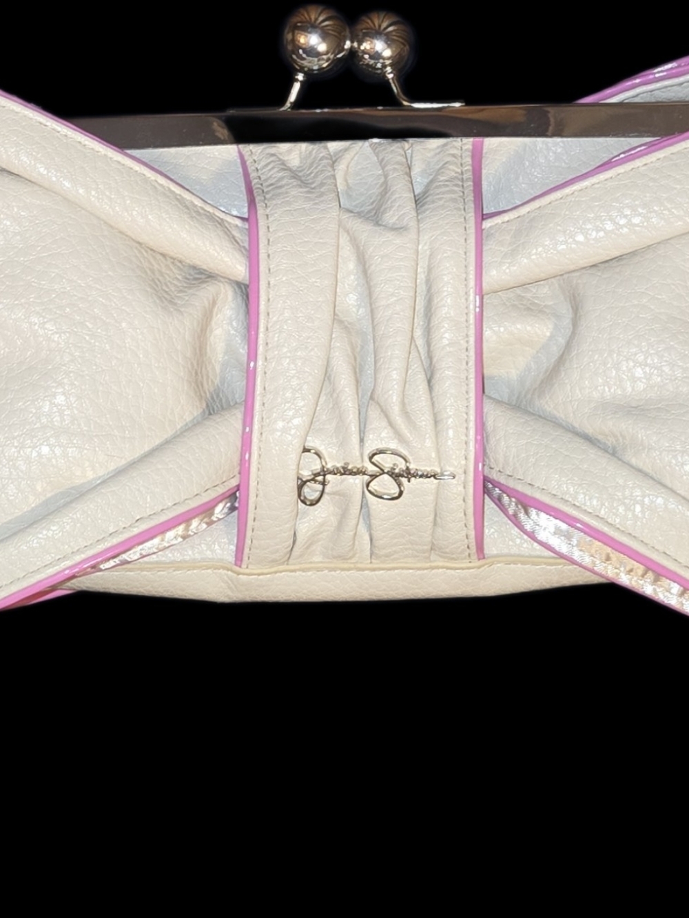 Elegant Cream Kiss-Lock Clutch with Pink Trim By Jessica Simpson. Flawless.